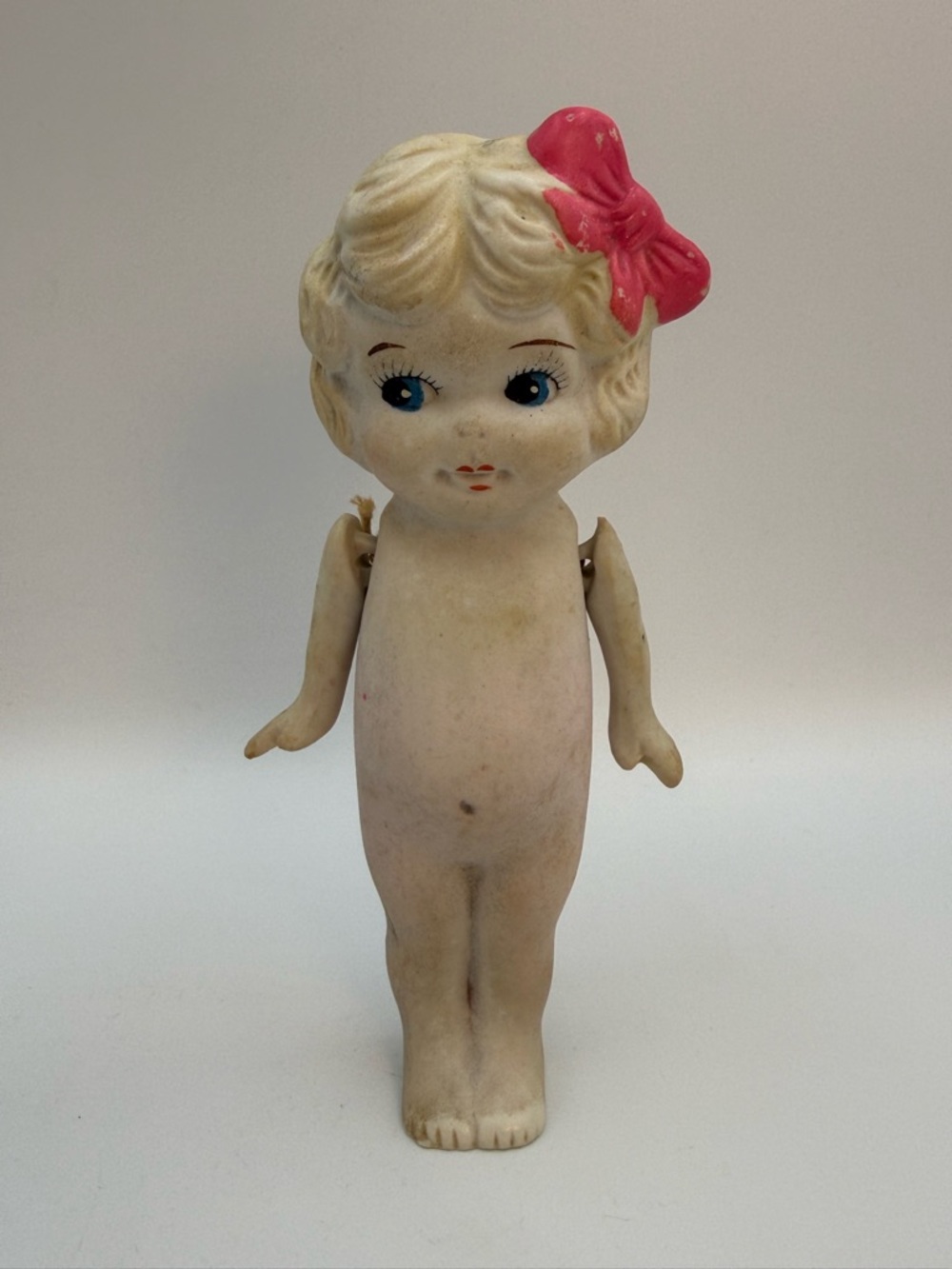 Antique Japan Bisque Kewpie Flapper Doll Strung Arms Blonde Hair Pink Bow